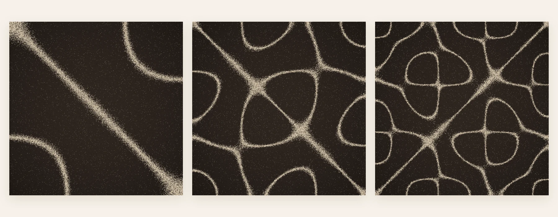 Three square plates, each dark with pale sand gathered along lines: a single diagonal with two curves at the corners, then a lattice of rounded cells, then an intricate pattern of rings and crossing diagonals
